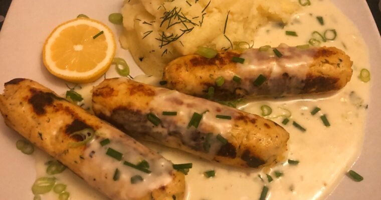 Seafood sausage with lemon and parsley sauce